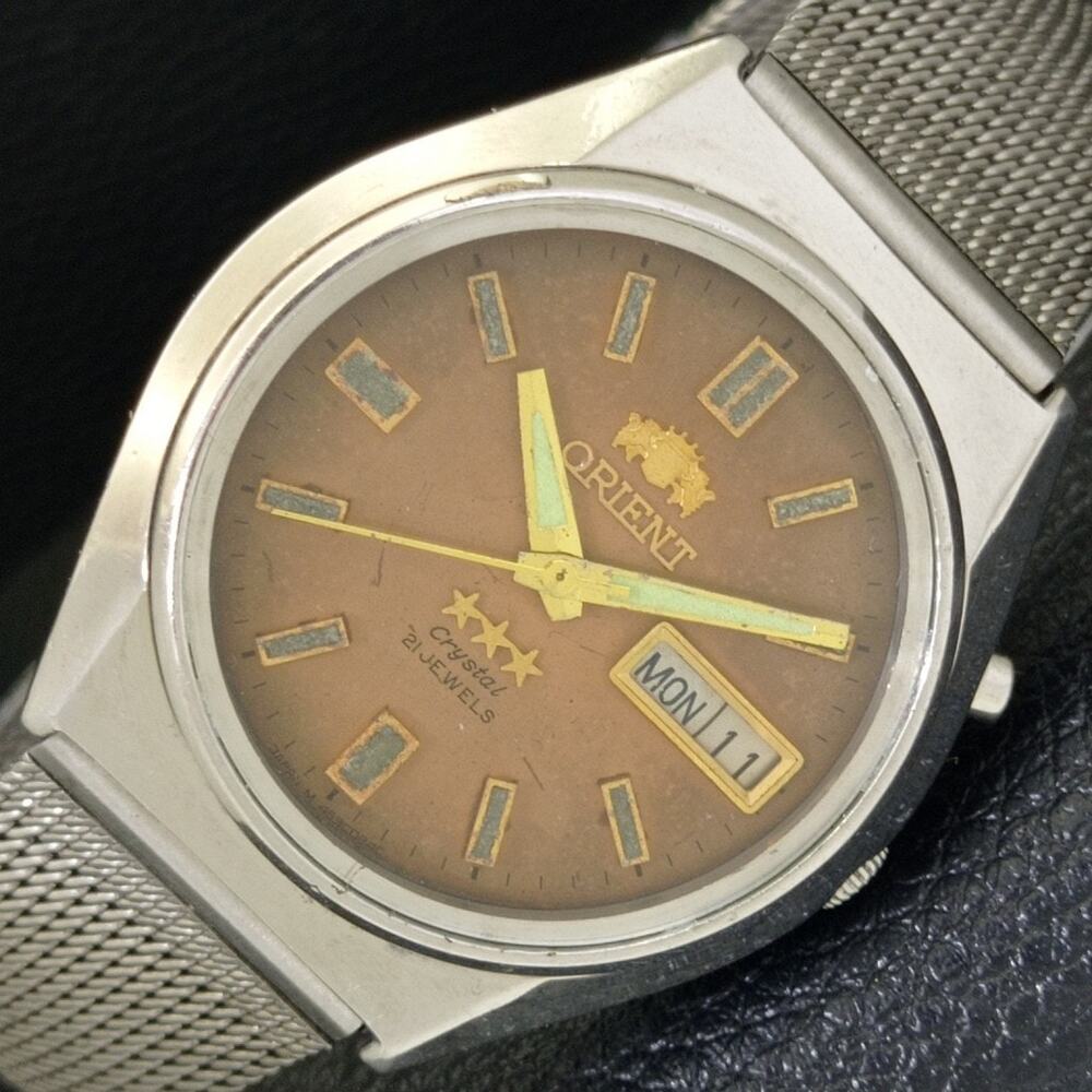 Vintage 1974 Orient Automatic Mens Silver Watch W/daydate & Gold accents